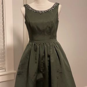 Cocktail dress from Davids Bridal. Size 8. Dark moss green color